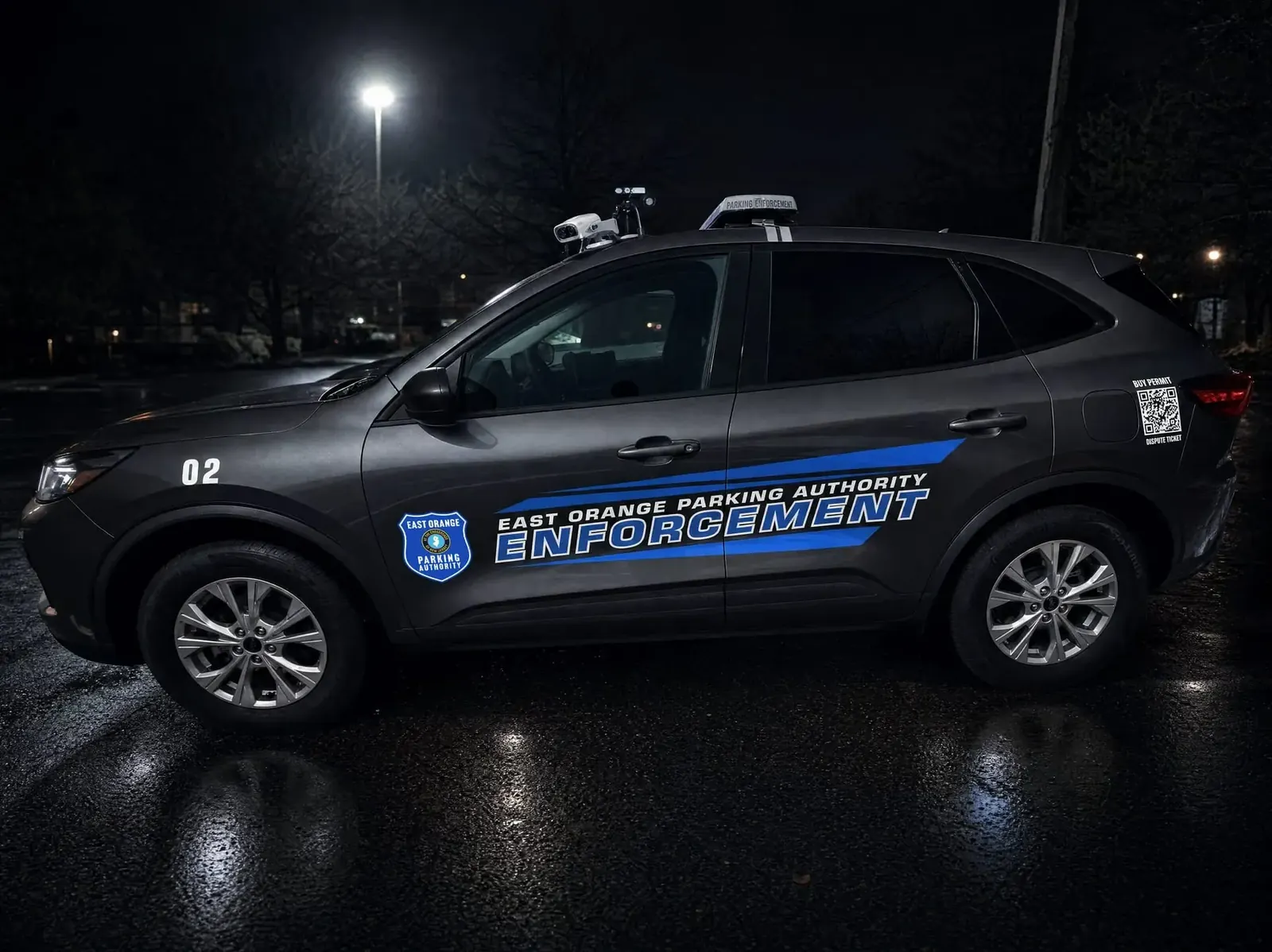 EAST ORANGE PARKING AUTHORITY stripes + lettering — night