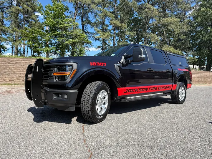 JACKSON FIRE BUREAU stripes + lettering — front three-quarter