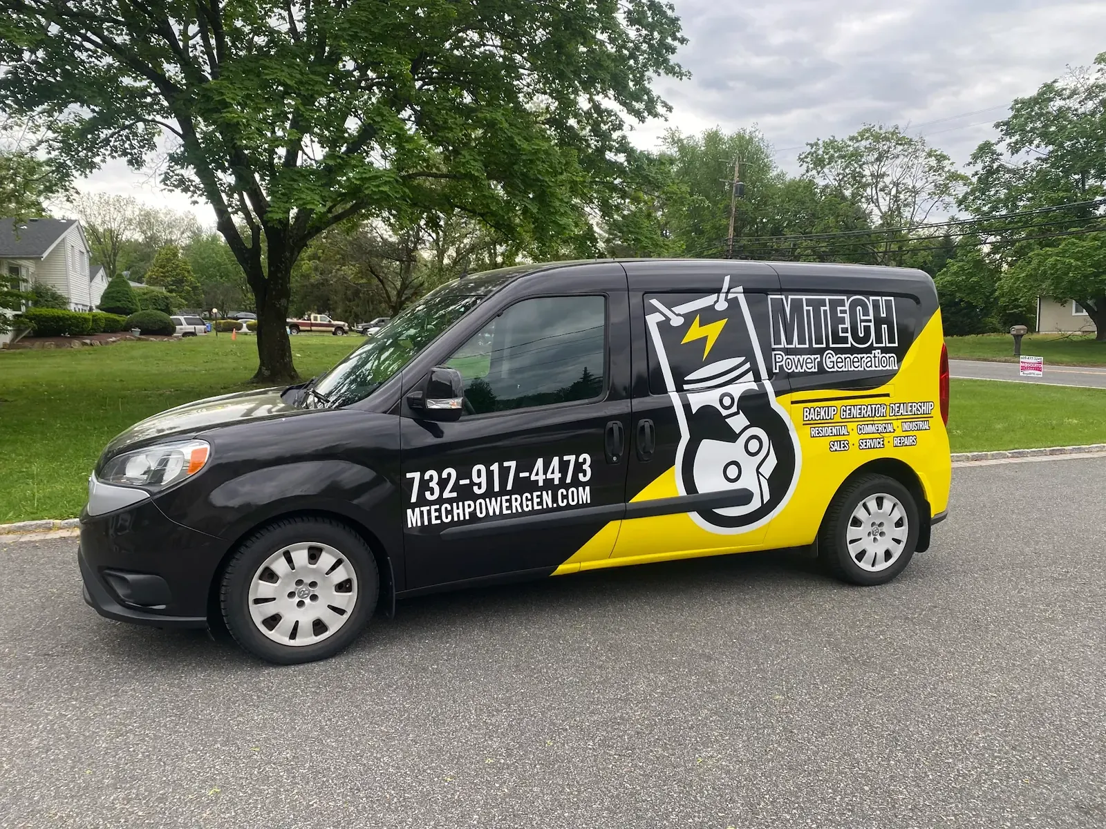 MTECH POWER GENERATION partial wrap — front three-quarter