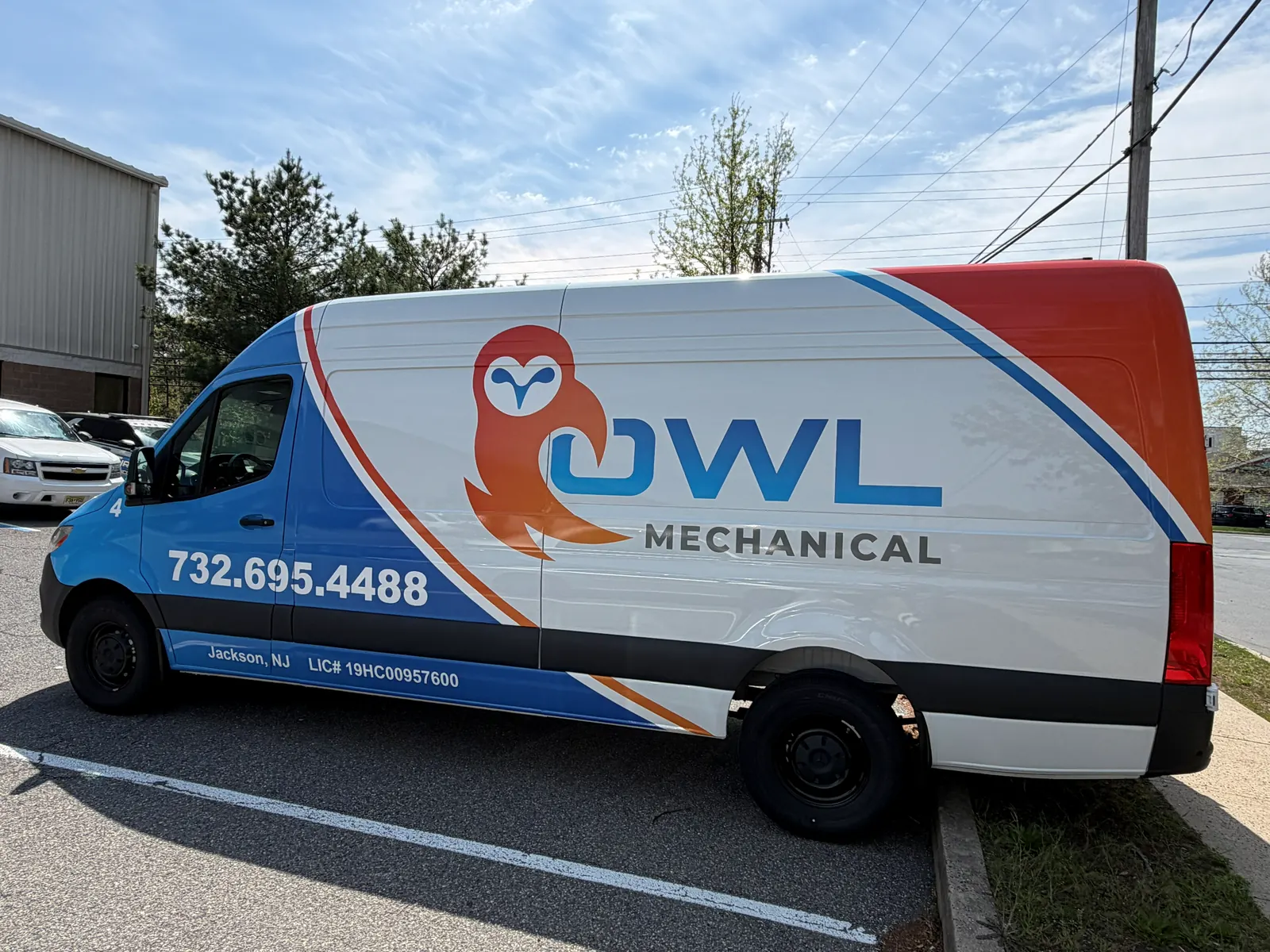 OWL MECHANICAL full wrap — driver side